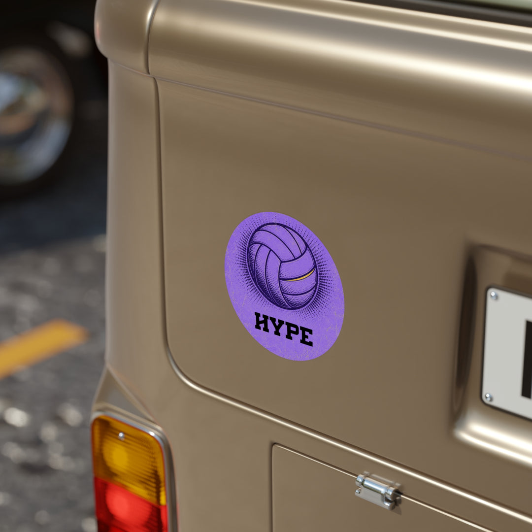 A circular purple sticker featuring a volleyball graphic and the word &