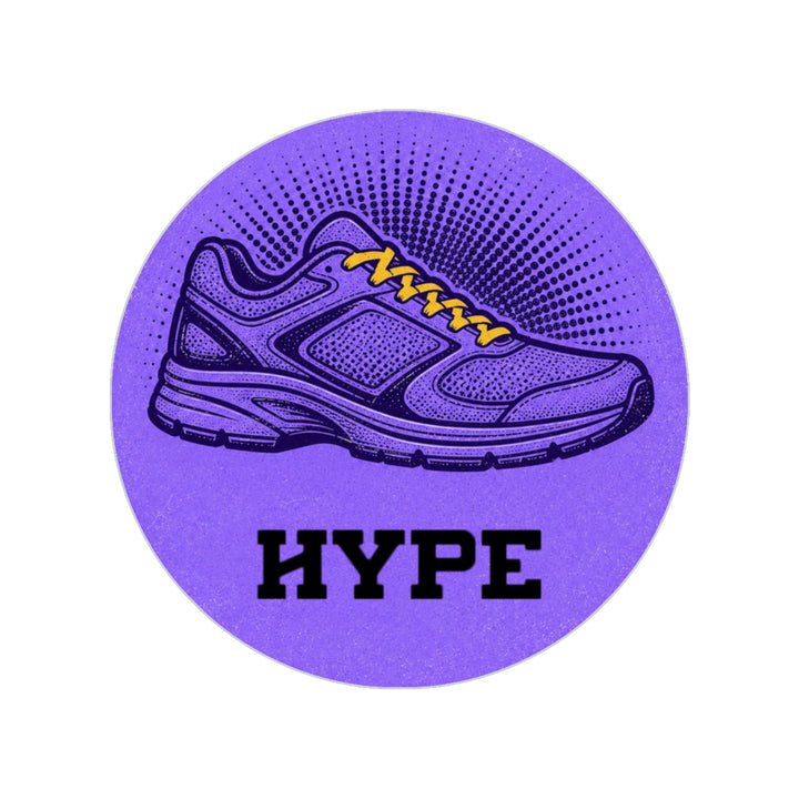 A circular purple sticker or patch featuring a stylized running shoe with yellow laces and the word &