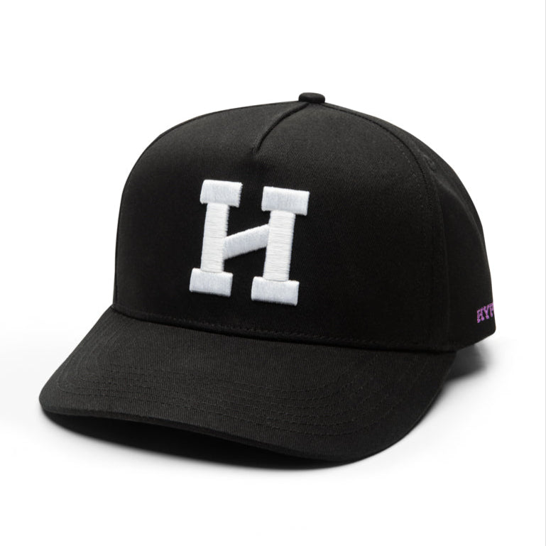 A black structured 5-panel snapback cap with a bold white Hype logo on the front.