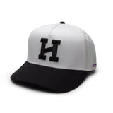 A black structured 5-panel snapback cap with a bold white Hype logo on the front.