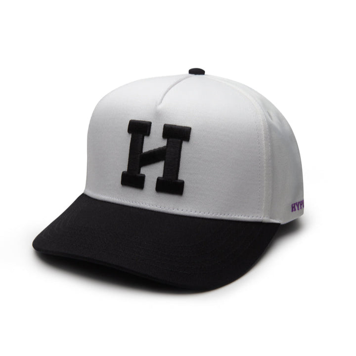 A black structured 5-panel snapback cap with a bold white Hype logo on the front.